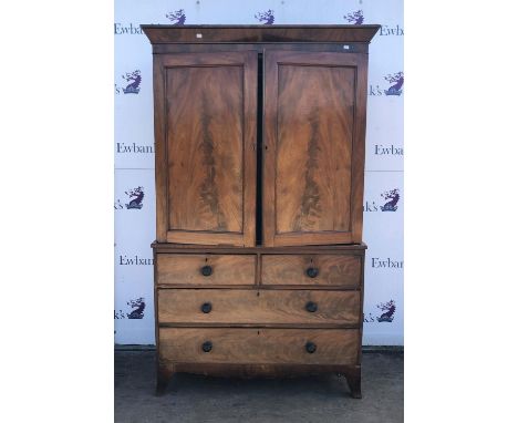 George lll Mahogany linen press, upper with panelled doors, lacking shelves, base has two short over three long drawers on br