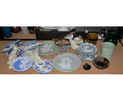 Quantity of Continental porcelain plaques and plates, 20th Century, decorated in the manner of Jasperware, together with a gl