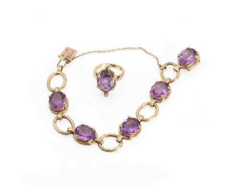 A gold amethyst bracelet and ring suite,comprising a gold textured oval link amethyst bracelet, with oval cut amethysts, claw