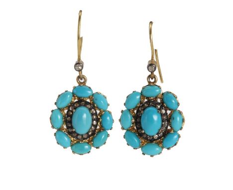 A pair of silver gilt turquoise and rose cut diamond drop earrings,each centred by an oval cabochon turquoise claw set to a s