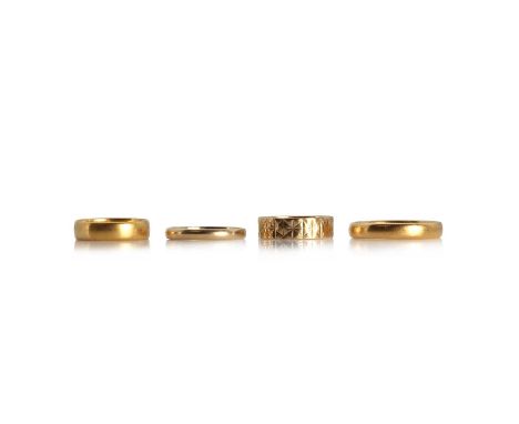 Four gold wedding rings,comprising a 22ct gold wedding ring, with a plain low 'D' profile, 4.35mm wide, Birmingham 1955, a 22