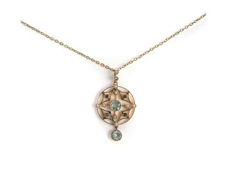 A gold split pearl, topaz and aquamarine drop pendant, with a central circular cut ice blue topaz to knife edge wires with sp