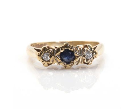 A 9ct gold sapphire and diamond illusion set three stone ring,  Birmingham 1978. 2.04g. Finger size K ½Buying this gemstone r