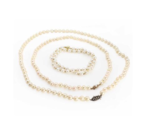 Three single row uniform cultured pearl necklaces,comprising a single row uniform cultured pearl necklace, pearls 6.97mm to 7