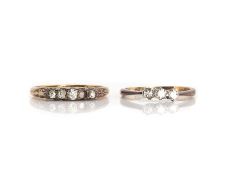 Two diamond rings, comprising an Edwardian 18ct gold five stone carved head diamond ring, two small diamonds deficient, with 