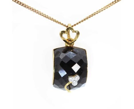 A gold onyx and diamond pendant, with a floral trefoil of brilliant cut diamonds, bezel set in white to a chequerboard cut on