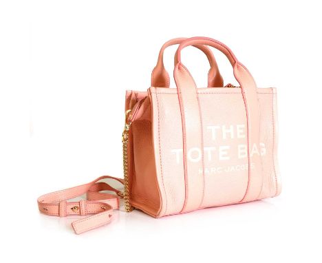 A Marc Jacobs pink Tote bag,dual rolled handles and detachable shoulder strap, gold toe hardware, zip closure with interior s