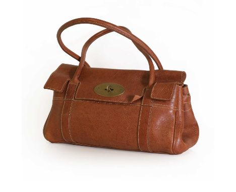 A Mulberry brown East West Bayswater,brass tone hardware with postmans lock closure, dual rolled handles, interior zip pocket
