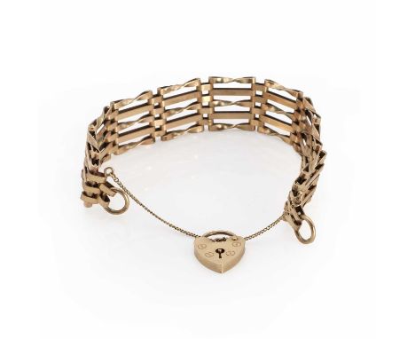 A 9ct gold five bar gate bracelet,with heart-shaped padlock clasp and safety chain, 170mm long, London 1975, 1976. 19.07gCond