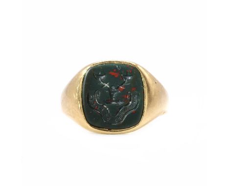 An 18ct gold signet ring set with a bloodstone intaglio, a cushion shape bloodstone tablet, with an engraved intaglio, to tap