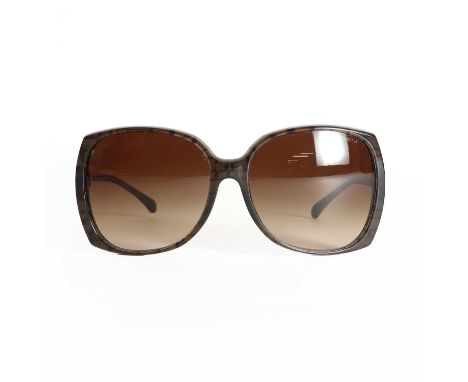 A pair of Chanel brown framed sunglasses,5216, with light translucency to frames and brown graduating lens, size 61-16-135, w