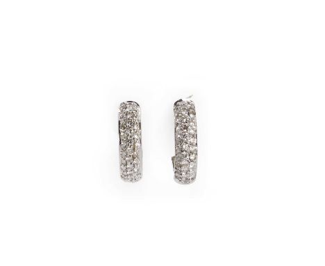 A pair of white gold, diamond set 'huggy' style hinged 'D' section hoop earrings,brilliant cut diamonds, pavé set to the fron