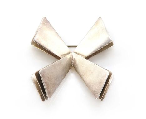 A Danish sterling silver brooch, by Georg Jensen, c.1960,no.335, designed by Nanna and Jorgen Ditzel. Three wavy, flat sectio