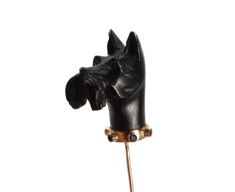 A dog's head stick pin set with coloured stones, the realistically modelled black head of a Scottie or similar terrier, with 