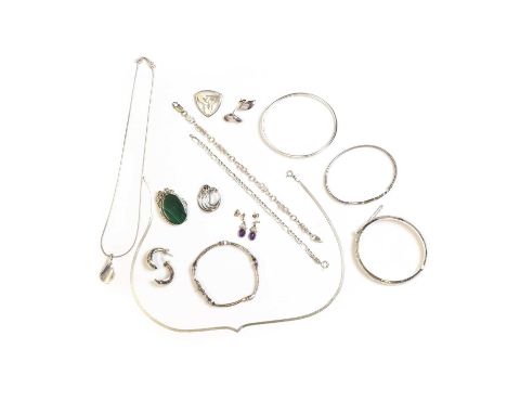A collection of silver jewellery, to include a hallmarked silver hinged bangle with engraved front, a hallmarked bracelet set