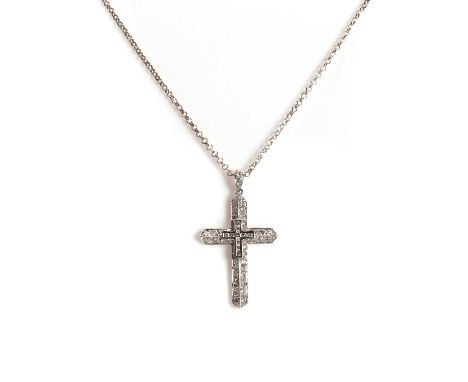 A white gold diamond cross pendant,with brilliant cut diamonds, channel set to a flat section cross, set centrally to a facet