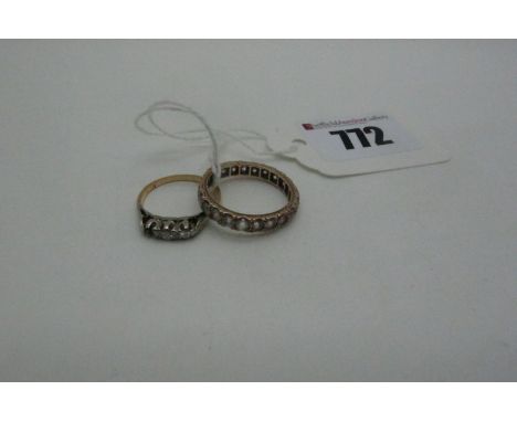 An Eternity Band, inscribed "9ct" (lacking stone); together with a three stone ring (lacking stone). (2) 