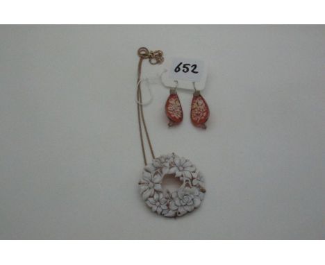 A Modern Large Highly Decorative Shell Carved Floral Circlet Pendant, on a gilt chain stamped "925"; together with a pair of 