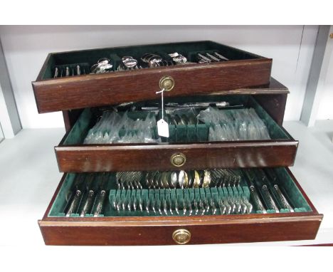 A Three Drawer Canteen Chest of Kings Pattern Plated Cutlery, twelve setting, fitted throughout, including meat carving set, 