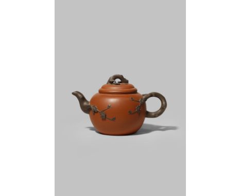 A CHINESE YIXING TEAPOT AND COVER LATE QING DYNASTY The spout, handle and finial in darker clay formed as prunus branches and