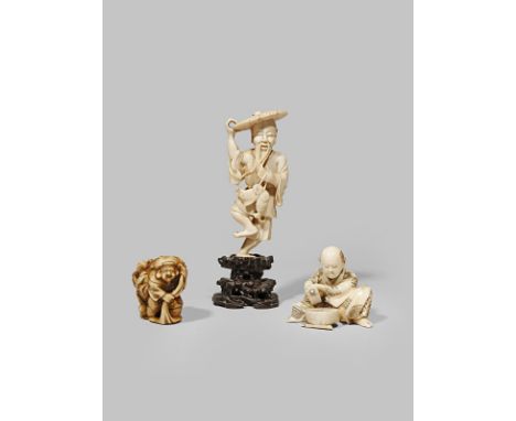 λ A CHINESE IVORY CARVING 19TH CENTURY Depicting a fisherman standing on one foot and with a wood stand, together with an ivo