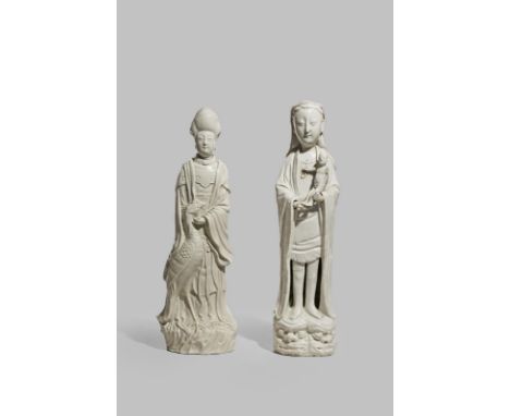 TWO RARE CHINESE BLANC DE CHINE FIGURES 18TH CENTURY One with a high chignon and long flowing robes with a phoenix at her fee