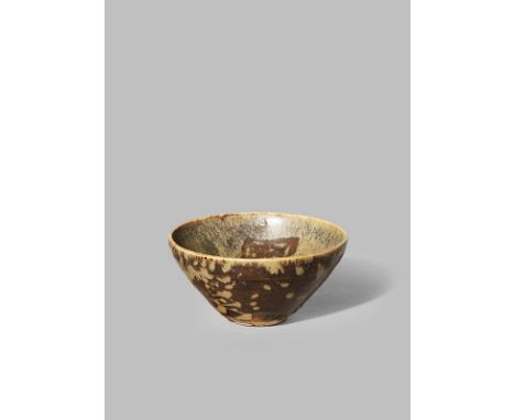 A CHINESE JIZHOU 'PAPER-CUT' BOWL SONG DYNASTY 960-1279 With a wide flared conical body decorated to the interior with three 
