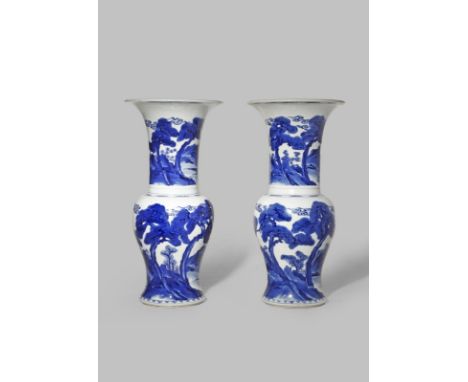 A PAIR OF CHINESE BLUE AND WHITE YEN YEN VASES KANGXI 1662-1722 Each painted in bright underglaze blue with four deer and thr