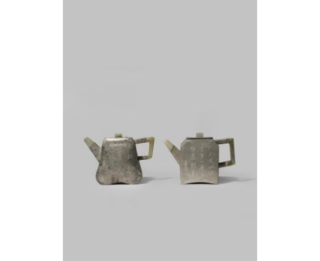 TWO CHINESE INSCRIBED PEWTER-ENCASED YIXING TEAPOTS AND COVERS QING DYNASTY Each set with a jade handle, spout and knop, both