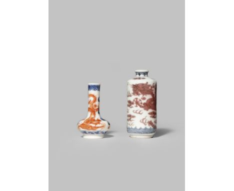 TWO CHINESE PORCELAIN SNUFF BOTTLES 19TH CENTURY Both painted with dragons, one in underglaze red, the other in iron-red enam