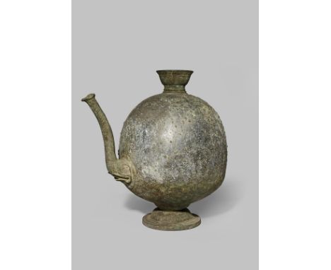 A LARGE VIETNAMESE METAL ALLOY EWER C.12TH CENTURY The plain ovoid body with an elephant trunk-shaped spout, a tapered mouth 