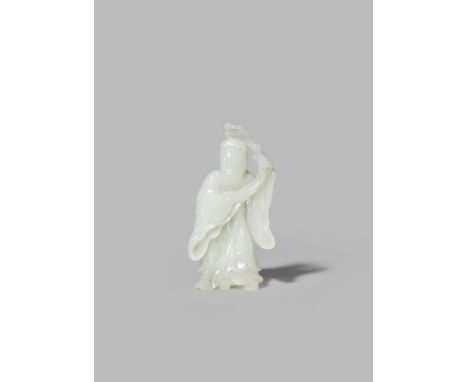 A CHINESE PALE CELADON JADE CARVING OF SHOULAO QIANLONG 1736-95 Standing, wearing long flowing robes and holding a prunus bra