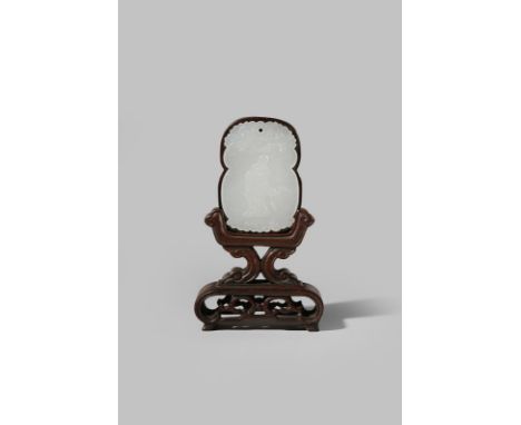 A CHINESE WHITE JADE PENDANT QING DYNASTY OR LATER Carved in shallow relief with a standing Immortal accompanied by a crane e