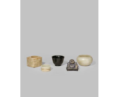 FIVE CHINESE HARDSTONE CARVINGS QING DYNASTY AND EARLIER Comprising: an archaistic chicken bone jade cong, a pale celadon jad