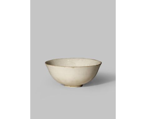 A SMALL CHINESE DING BOWL SONG DYNASTY 960-1279 The U-shaped body with a gently flaring rim, incised with a stylised flowerhe