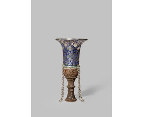 AN INDIAN ENAMELLED SILVER AND WOOD HOOKAH CUP TOP 19TH CENTURY With an intricately carved stem decorated with birds and blos