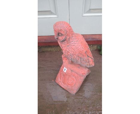 A barn owl roof ridge cast stone finial on a V 90 degree tile - Length 18cm x Width 22cm x Height 45cm 