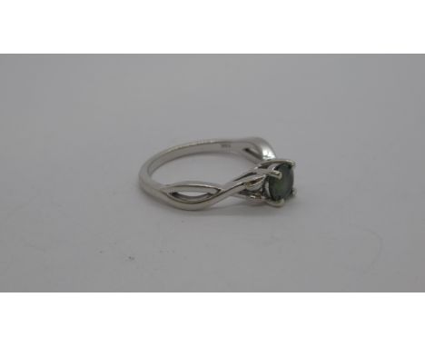 A 14ct white gold (hallmarked) sapphire single stone ring - approx 0.60ct - ring size K - approx weight 2.6 grams - retailed 