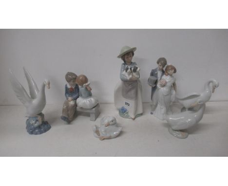 Seven Lladro Nao figures 