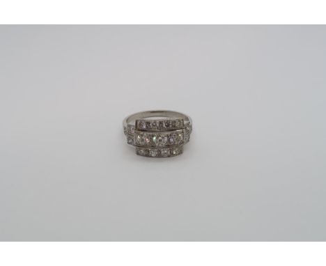 An Art Deco style platinum three row diamond ring with diamond shoulders - diamond weight approx 1.5ct - head size approx 18m