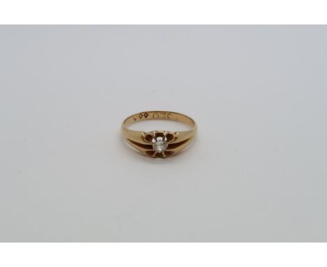 An 18ct yellow gold hallmarked single stone diamond ring, size S, approx 4 grams 