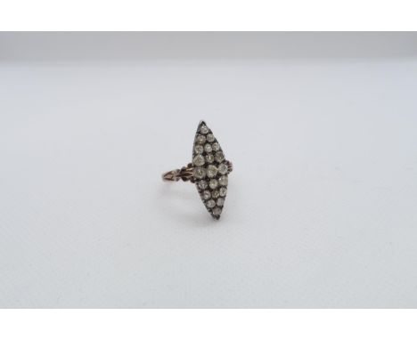 A Victorian diamond cluster ring in Marquise setting - 21 old cut diamonds set in yellow and white metal - ring size P/Q - ap