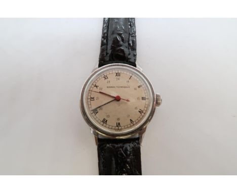 A Girard-Perregaux stainless steel manual wind wristwatch, brushed dial with 24hr - case 30mm - working in the saleroom 