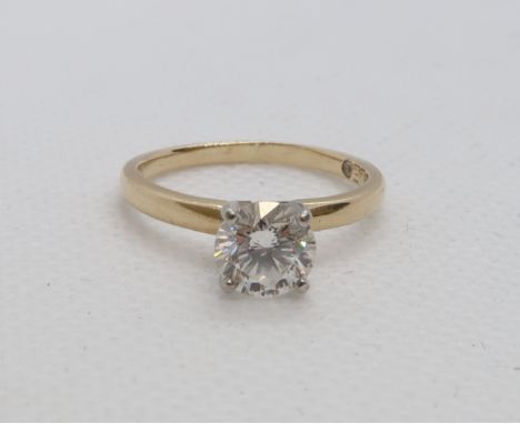 A classic diamond solitaire ring - The Leo Collection - The round brilliant cut diamond approx 1.11ct proudly set in 14ct yel