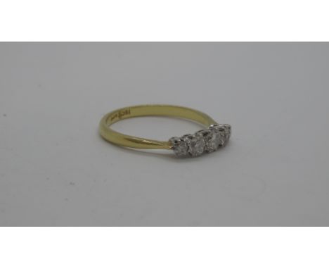 An 18ct (hallmarked) yellow gold five stone diamond ring, graduated round brilliant cut diamonds - ring size Q - approx weigh