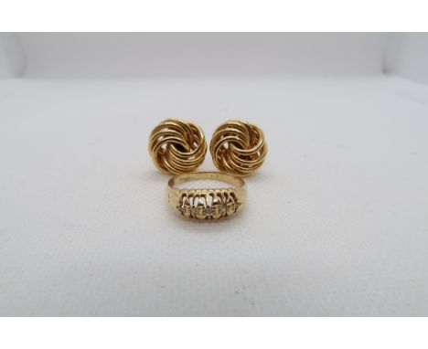 A pair of 18ct (hallmarked) yellow gold stud earrings together with an 18ct yellow gold ring size K/L - total weight approx 6