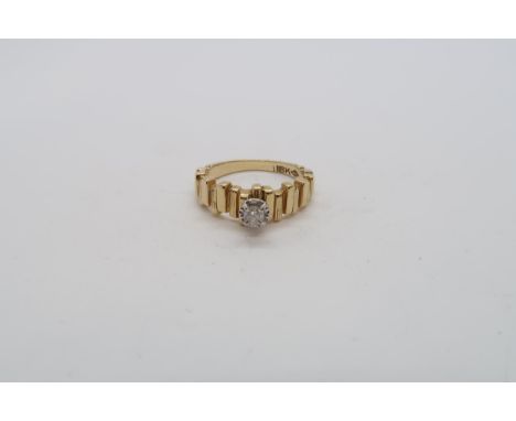 An 18ct yellow gold hallmarked single stone diamond ring, size L, approx 4.6 grams 