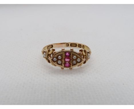 A Victorian 15ct yellow gold (hallmarked) ring with rubies and pearls - ring size R - weight approx 1.8 grams 