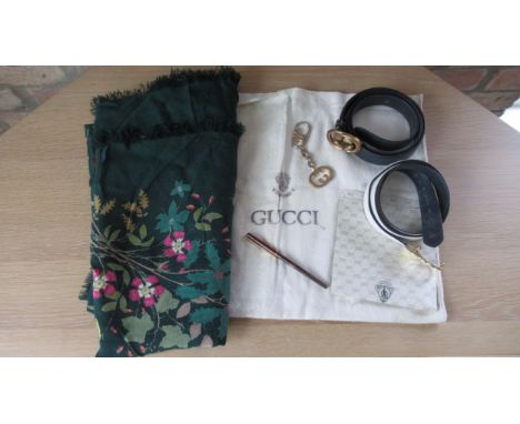A Gucci shawl 130cm x 130cm together with other Gucci accessories including pen, key ring, belts etc 