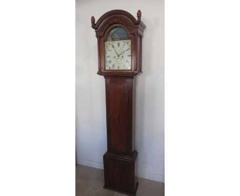 An 8 day longcase clock - the painted dial with a rocking ship Bennett of Kingsbridge in a stained pine case with weights and